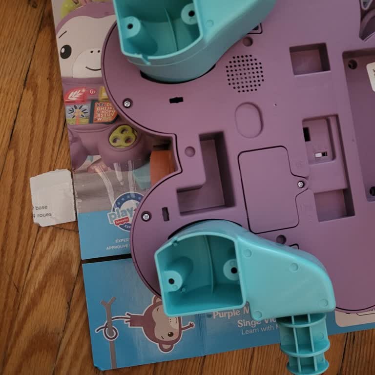 Fisher-Price Purple Monkey Walker Missing Screws in the Box