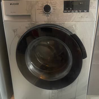 Arçelik Çamaşır Makinesinin Ön Panelindeki Lekeler Garanti Kapsamında Değiştirilmelidir