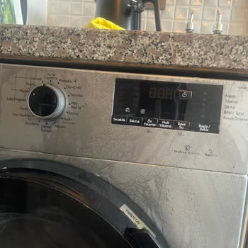 Arçelik Çamaşır Makinesinin Ön Panelindeki Lekeler Garanti Kapsamında Değiştirilmelidir