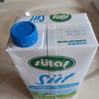 Dörtlü Süt Paketinde Tek Bozuk Şişe