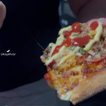 Domino's Pizzada Saç Kılı