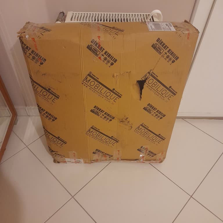 Kargo Personelinin Ağır Koliyi Apartman Girişine Bırakması Ve Uyarı Talebi