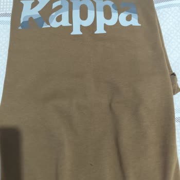 Kappa Tişörtte Orta Bölümde İlmek Kaçması Ve Değişim Talebi