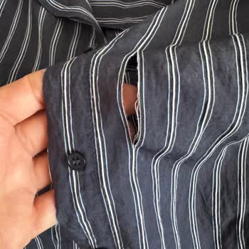 LCW Gömleğinde Üretim Hatası: Düğme İlikleri Kısa Sürede Yırtıldı