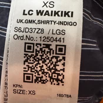 LCW Gömleğinde Üretim Hatası: Düğme İlikleri Kısa Sürede Yırtıldı