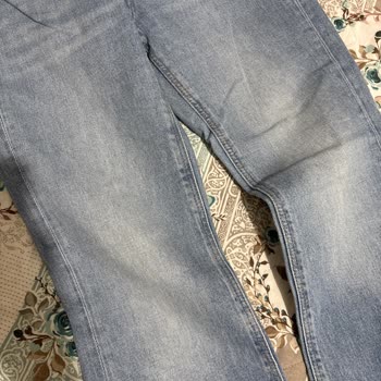Mavi Jean Pantolonunda Hızlı Renk Solması Ve Ağ Bölümünde Yırtılma