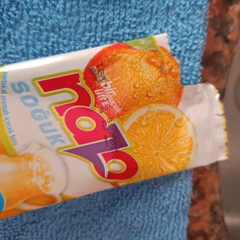 Tarih Geçmemiş Nazo Portakal İçeceğinde Siyah Yabancı Maddeler Ve Firma İletişimsizliği