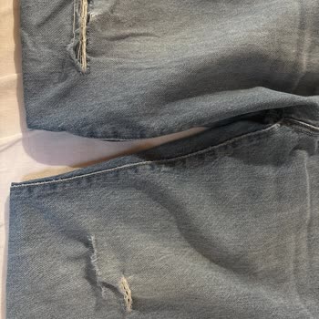 Milan Model Kot Pantolonun Diz Yırtılması Ve Tekrarlayan Kalite Problemleri