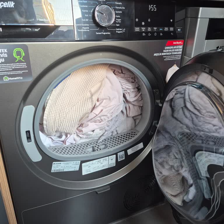 Arçelik Kurutma Makinesinde Kapak Yönü Değişikliği Ve Su Gideri Bağlantısı Hatası