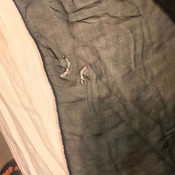 İpek Bluzdaki Kesik Ve Diğer Hasarlar, Şirketin Sorumluluk Reddi