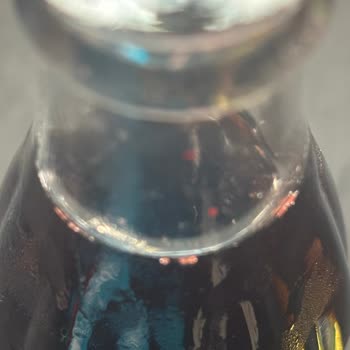 Coca-Cola Cam Şişede Kırmızı Parçacıklar Gıda Güvenliğini Tehdit Ediyor