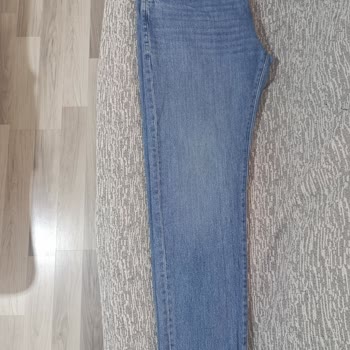 Mavi Pantolonun Renk Atması, Üst Kısmındaki Esneme Ve Garanti Reddi