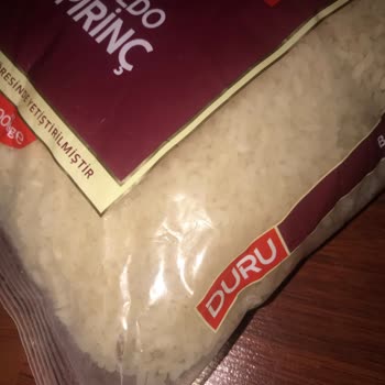 Kapalı Pirinç Paketinde Kelebek Keşfi Sağlık Ve Kalite Endişesi