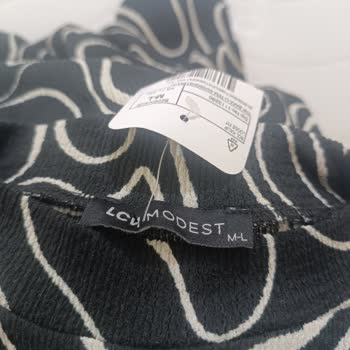 Defolu Sweatshirt Tunik İçin İade Sonrası Hediye Çeki Reddi