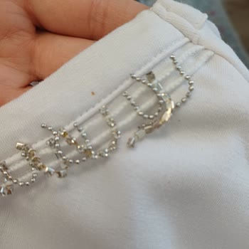 Yaka Boncukları Paslanan T-Shirt İçin Ayıplı Ürün İade Talebi