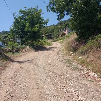 Çağlarca Mahallesi Tekir Gölü Sokak'ta Bozuk Yol Ve Yağışta Ulaşım Sorunu