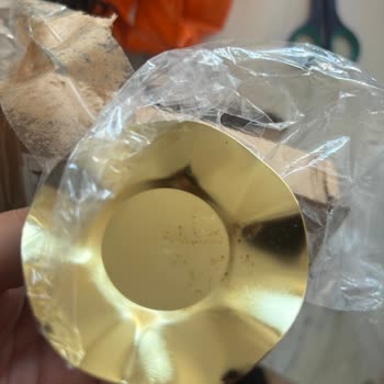 Paslı Ve Çizikli Metal Sunumluk: Teslimat Ve İade Sorunları