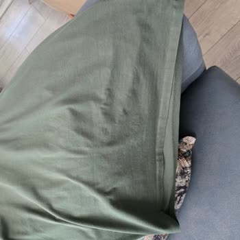 Mavi Tişört Yıkamadan Sonra İki Beden Küçülmüş