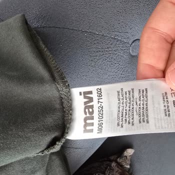 Mavi Tişört Yıkamadan Sonra İki Beden Küçülmüş