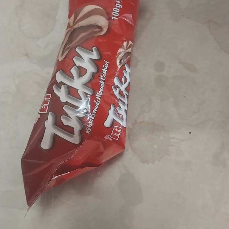Eti Tutku Kakaolu Kremalı Mercek Bisküvilerinde Yarı Boş Paket