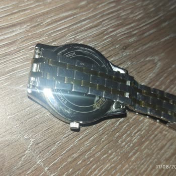 Pas Kokulu Metal Saat Ve Garanti Belgesi Eksikliği