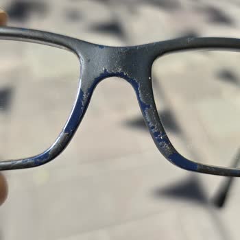 Four-Year-Old Prada Eyeglass Frame Suffers Severe Sun Fading and Coating Peeling