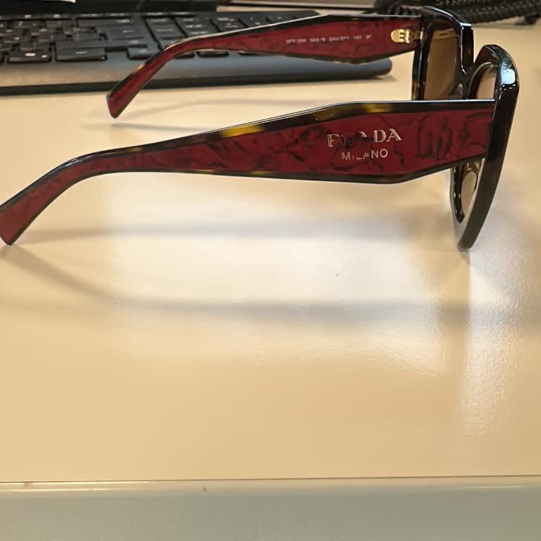 Prada SPR 14W Temple Logo Wears Off Leaving Permanent Stain on Frame