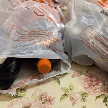 Migros Sanal Market'te Yırtık Poşetlerde Şişeler Teslim Edildi, Notlar Göz Ardı Edildi