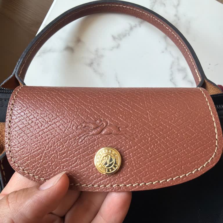 Sahte Longchamp Çantası, Tehdit Ve Hakaret