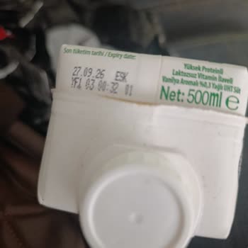 Migros Hemen'de Son Kullanma Tarihi Uzak Olmasına Rağmen Bozulmuş Süt