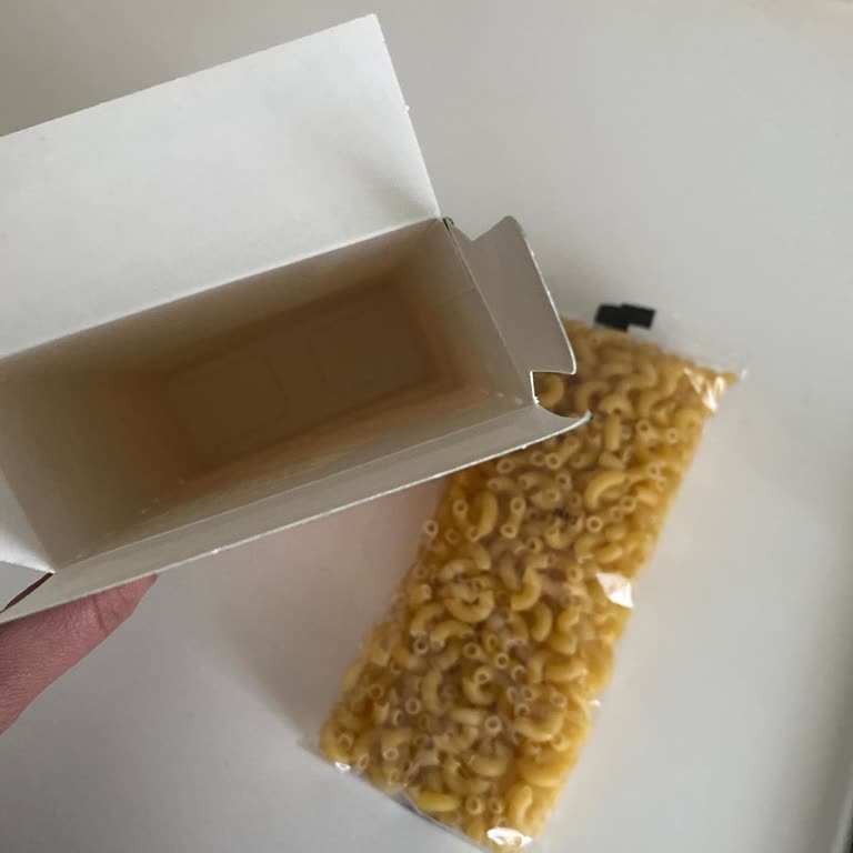 Falta de polvo de queso en Mac and Cheese Knorr, solicito reembolso