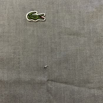 Lacoste Gömlekte Üretim Hatası İlk Ütüde Kesik Görüldü