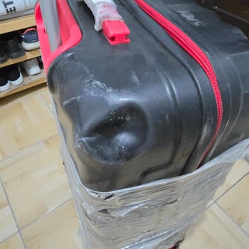 Sürat Kargo'nun Hasarlı Valiz Teslimatı Ve Sorumluluk Reddi