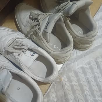 Suela despegada en zapatillas Fila sin motivo, solicito cambio o reembolso