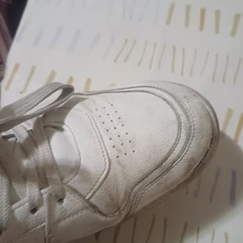 Suela despegada en zapatillas Fila sin motivo, solicito cambio o reembolso