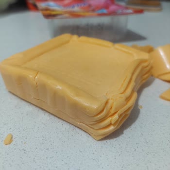 Dilimli Cheddar Peyniri Parçalandı, Kullanılamaz Oldu