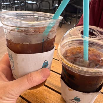 Caribou Coffee Coffee Lids Were Not Properly Checked and Caused Coffee to Spill on Us
