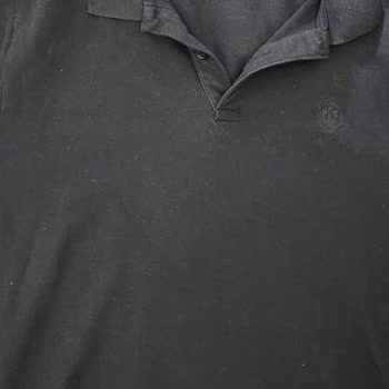 İlk Yıkamada Kısalan Siyah T-Shirt'le Mağazanın İade Reddi