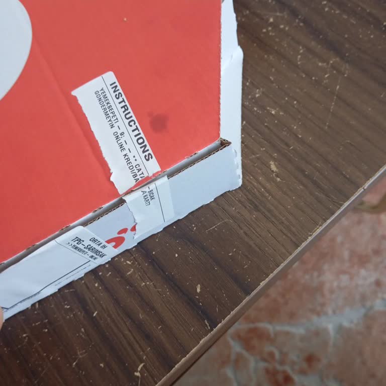 Kesik Güvenlik Etiketiyle Gelen Pizza İçin Açıklama Talebi