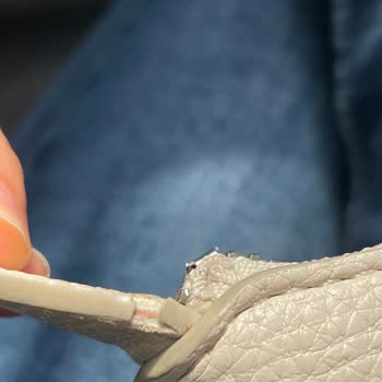 Boyner'den Alınan Tommy Hilfiger Çantasında Üç Ayda Deri Soyulması Ve Sap Bağlantısının Yırtılması