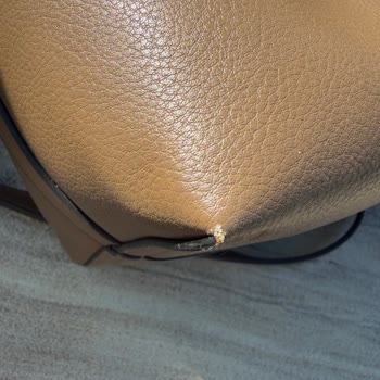 Tommy Hilfiger Kadın Çantasında Kısa Sürede Kopma Ve Yırtılma