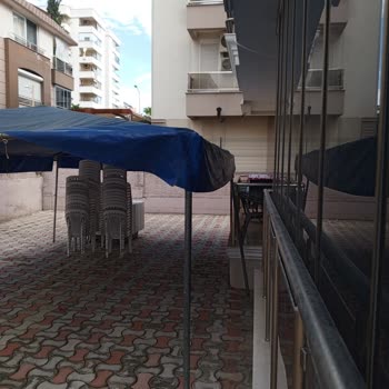 Antalya Büyükşehir Belediyesi Çadırının Balkon Yakınlığı Nedeniyle Yağmur Suyundan Mağduriyet Ve Tazminat Talebi