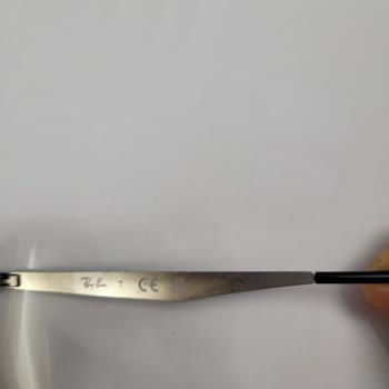 Atasun Optik'ten Alınan Rayban Gözlüğün Çerçevesi Soyuluyor Ve Lens Rengi Değişiyor: Garanti Reddi