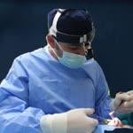 Dr.